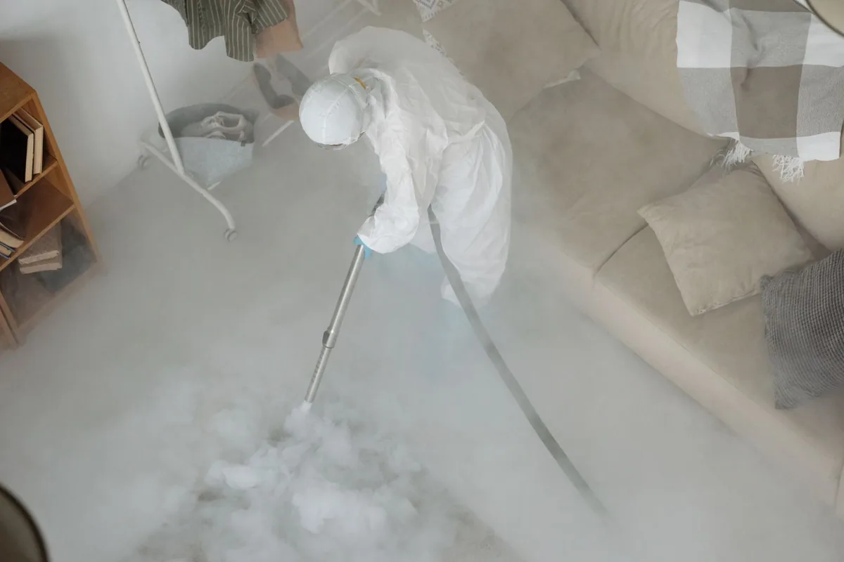 Biohazard cleanup technician in protective equipment, Banks, OR
